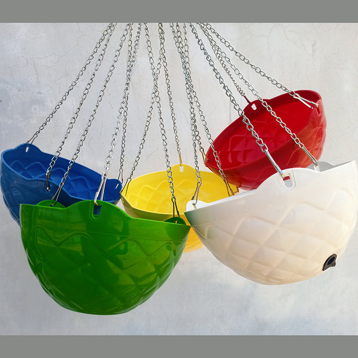 A set of four colorful plastic hanging baskets with a diamond design, suspended by iron chains.